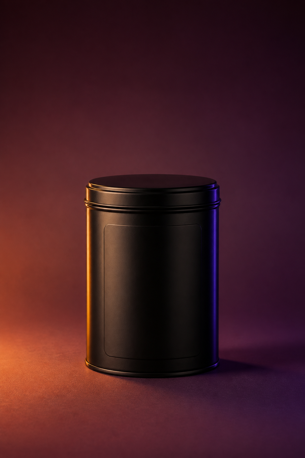 Matte black coffee tin transformed into a warm burgundy editorial product photograph